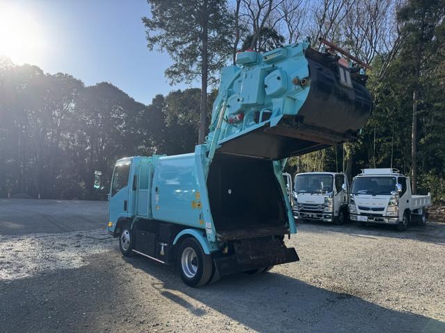 エルフトラック 巻込みパッカー　極東開発　ＧＢ３８－８２１Ｄ－Ｓ　３．８立米　連続スイッチ　走行７６千ｋｍ　積載２ｔ　Ｆ６　６速　マニュアル　塵芥車　巻き込み式　ゴミ収集車　回転板式　バックカメラ　ドラレコ（11枚目）