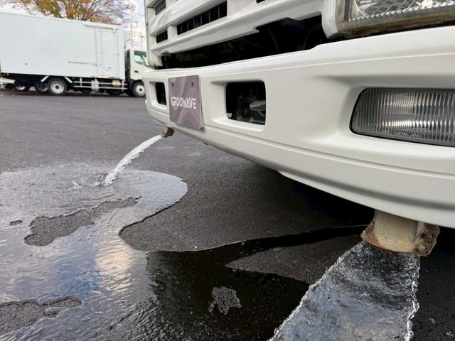 エルフトラック 散水車　ワイド　極東開発　ＬＨ０４－３０２Ｒ　前後散水　サブエンジン式　容量４０００Ｌ　吸入ホース　走行２７千ｋｍ　積載４ｔ　Ｆ６　６速　マニュアル　ＥＴＣ１．０（12枚目）