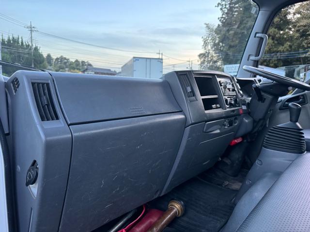 エルフトラック 散水車　ワイド　極東開発　ＬＨ０４－３０２Ｒ　前後散水　サブエンジン式　容量４０００Ｌ　吸入ホース　走行２７千ｋｍ　積載４ｔ　Ｆ６　６速　マニュアル　ＥＴＣ１．０（34枚目）