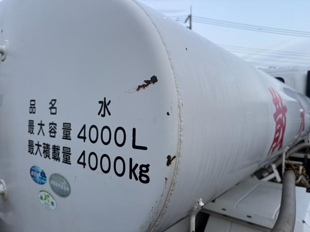 エルフトラック 散水車　ワイド　極東開発　ＬＨ０４－３０２Ｒ　前後散水　サブエンジン式　容量４０００Ｌ　吸入ホース　走行２７千ｋｍ　積載４ｔ　Ｆ６　６速　マニュアル　ＥＴＣ１．０（50枚目）