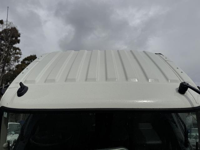 ファイター フックロール　極東開発　ＪＭ０４－５５－Ｄ　ツインホイスト　キャブバックステップ　ラジコン　車検付　積載３．４５ｔ　Ｆ６　６速　マニュアル　脱着装置付コンテナ専用車　コンテナ車　アームロール（42枚目）