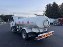 エルフトラック 散水車　ワイド　極東開発　ＬＨ０４－３０２Ｒ　前後散水　サブエンジン式　容量４０００Ｌ　吸入ホース　走行２７千ｋｍ　積載４ｔ　Ｆ６　６速　マニュアル　ＥＴＣ１．０（5枚目）