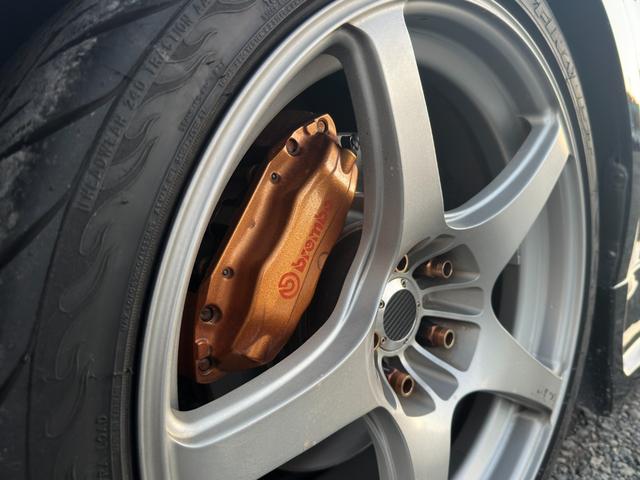 フェアレディZ バージョンS 6MT/R35ルックウェーバースポーツエアロ/GTウイング/エンケイRP03/ローダウン/セミバケ/MOMOステ/LEDテール/アルパインオーディオ/社外マフラー/ブレンボキャリパー/ETC(24枚目)