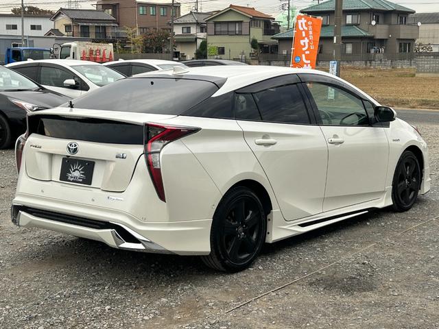 プリウス Ｓセーフティプラス　１年保証付き／モデリスタエアロ／禁煙車／レーダークルーズ／クリアランスソナー／純正ナビ／フルセグＴＶ／Ｂｌｕｅｔｏｏｔｈ再生／バックカメラ／ＥＴＣ／フォグランプ／革巻きステアリング（10枚目）
