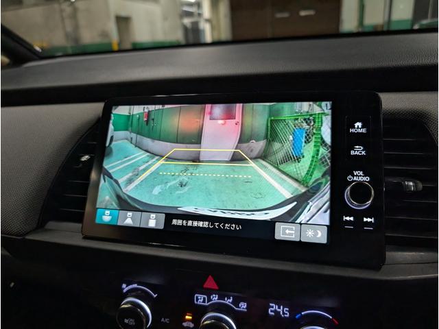 フィット ｅ：ＨＥＶクロスター　バックカメラ　ナビ　ＴＶ　クリアランスソナー　オートクルーズコントロール　レーンアシスト　衝突被害軽減システム　アルミホイール　オートライト　ＬＥＤヘッドランプ　スマートキー　電動格納ミラー　ＣＶＴ（5枚目）
