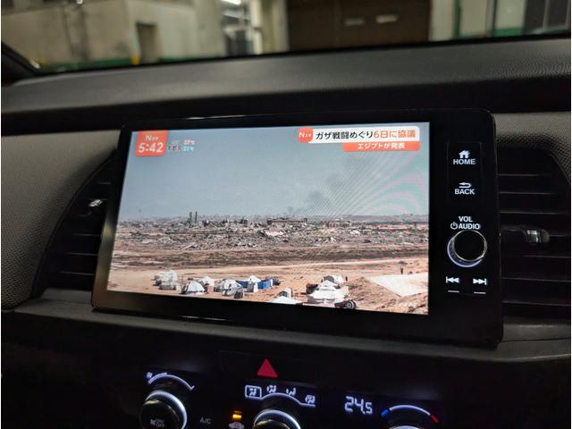 フィット ｅ：ＨＥＶクロスター　バックカメラ　ナビ　ＴＶ　クリアランスソナー　オートクルーズコントロール　レーンアシスト　衝突被害軽減システム　アルミホイール　オートライト　ＬＥＤヘッドランプ　スマートキー　電動格納ミラー　ＣＶＴ（30枚目）