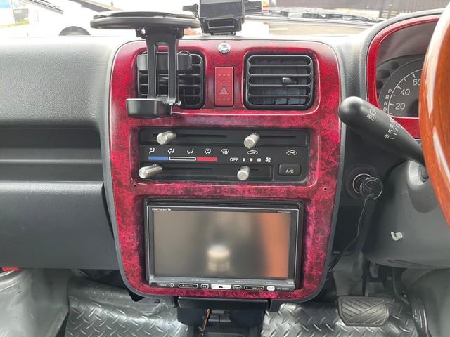 キャリイトラック ＫＣ　新品タイヤ　ローダウン　フルエアロ　社外ナビ　ヤンキーホン　アルミボックス　ステアリングナルディー　ＭＯＭＯシフト　内装張替え済み　ドラレコ　バックカメラ　ミュージックサーバー　ステッカー付（26枚目）