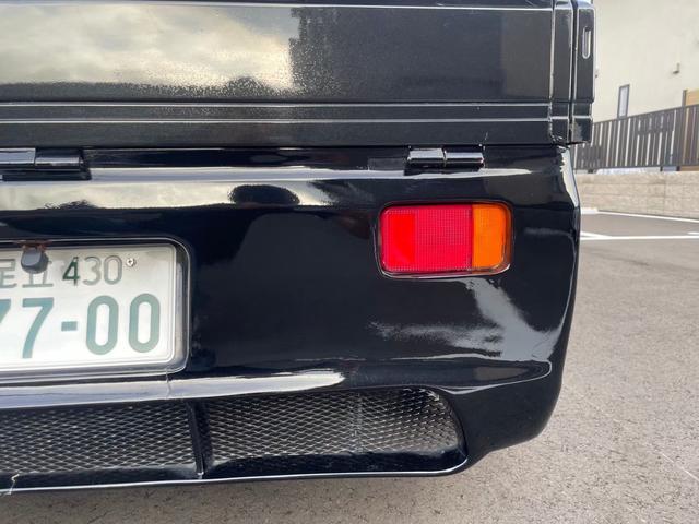 キャリイトラック ＫＣ　新品タイヤ　ローダウン　フルエアロ　社外ナビ　ヤンキーホン　アルミボックス　ステアリングナルディー　ＭＯＭＯシフト　内装張替え済み　ドラレコ　バックカメラ　ミュージックサーバー　ステッカー付（27枚目）