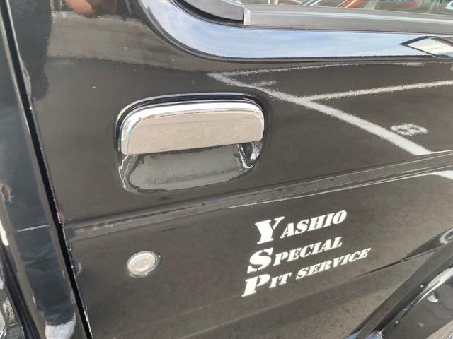 キャリイトラック ＫＣ　新品タイヤ　ローダウン　フルエアロ　社外ナビ　ヤンキーホン　アルミボックス　ステアリングナルディー　ＭＯＭＯシフト　内装張替え済み　ドラレコ　バックカメラ　ミュージックサーバー　ステッカー付（36枚目）