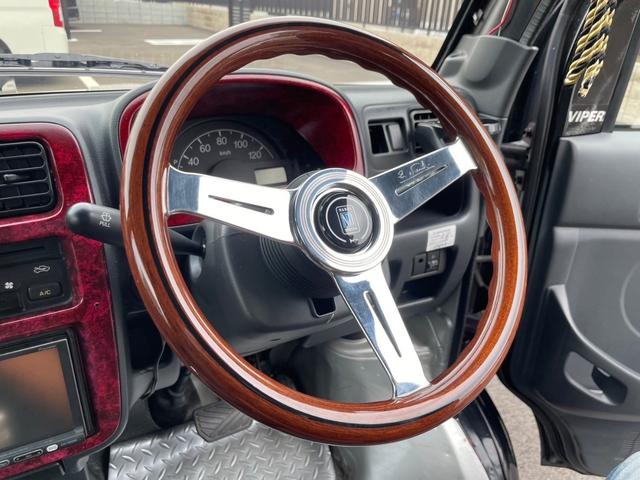 キャリイトラック ＫＣ　新品タイヤ　ローダウン　フルエアロ　社外ナビ　ヤンキーホン　アルミボックス　ステアリングナルディー　ＭＯＭＯシフト　内装張替え済み　ドラレコ　バックカメラ　ミュージックサーバー　ステッカー付（55枚目）