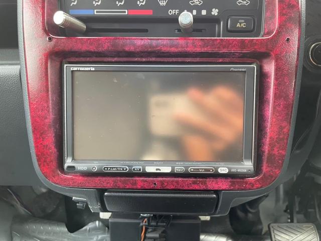 キャリイトラック ＫＣ　新品タイヤ　ローダウン　フルエアロ　社外ナビ　ヤンキーホン　アルミボックス　ステアリングナルディー　ＭＯＭＯシフト　内装張替え済み　ドラレコ　バックカメラ　ミュージックサーバー　ステッカー付（64枚目）