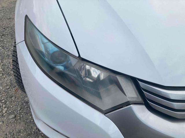 インサイト Ｌ　ドライブレコーダー　ＥＴＣ　バックカメラ　ナビ　ＴＶ　ＨＩＤ　ＣＶＴ　スマートキー　電動格納ミラー　盗難防止システム　衝突安全ボディ　ＡＢＳ　エアコン　パワーステアリング　パワーウィンドウ（24枚目）