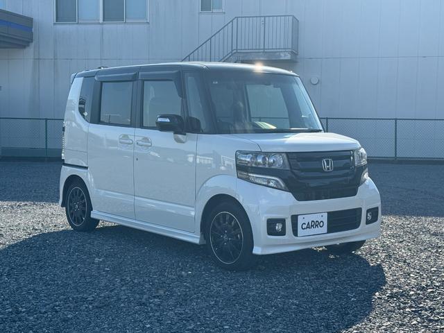 Ｎ－ＢＯＸカスタム ２トーンカラースタイル　Ｇ・ターボＬパッケージ　アルミ　キーレスエントリー　パワーステアリング　半革シート　ナビＴＶ　横滑り防止機能　パワーウィンドウ　ＬＥＤヘッドライト　電動格納ミラー　エアコン　スマートキー　ＡＢＳ　ＥＴＣ車載器　ＤＶＤ再生（4枚目）