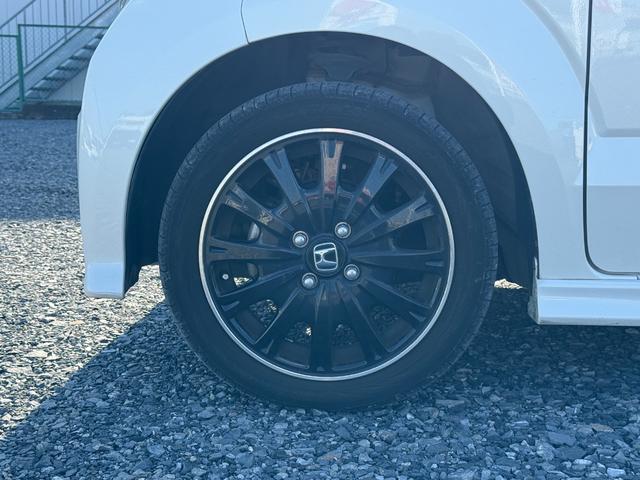 Ｎ－ＢＯＸカスタム ２トーンカラースタイル　Ｇ・ターボＬパッケージ　アルミ　キーレスエントリー　パワーステアリング　半革シート　ナビＴＶ　横滑り防止機能　パワーウィンドウ　ＬＥＤヘッドライト　電動格納ミラー　エアコン　スマートキー　ＡＢＳ　ＥＴＣ車載器　ＤＶＤ再生（10枚目）