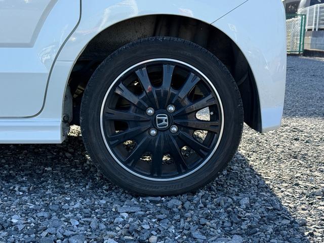 Ｎ－ＢＯＸカスタム ２トーンカラースタイル　Ｇ・ターボＬパッケージ　アルミ　キーレスエントリー　パワーステアリング　半革シート　ナビＴＶ　横滑り防止機能　パワーウィンドウ　ＬＥＤヘッドライト　電動格納ミラー　エアコン　スマートキー　ＡＢＳ　ＥＴＣ車載器　ＤＶＤ再生（11枚目）