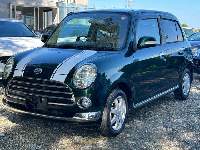 ミラジーノ プレミアムＸ　プレミアムＸ　ＭＯＭＯステアリング　純正ホイルホイル（5枚目）