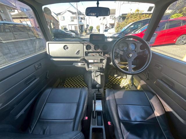 ジムニー ランドベンチャー　特別仕様車　社外品足回り・マフラー　パートタイム４ＷＤ　ツートン　エアコン　インタークーラーターボ　フロア３ＡＴ　ユーザー買取車（14枚目）