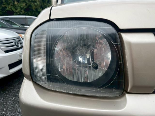 ジムニー ワイルドウインド 5速MT 16インチAW シートヒーター 寒冷地仕様 ルーフレール パワステ パワーウィンドウ 運転席・助手席エアバッグ エアコン クーラー フロントフォグランプ(11枚目)