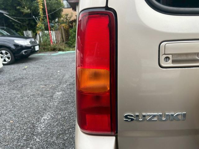 ジムニー ワイルドウインド 5速MT 16インチAW シートヒーター 寒冷地仕様 ルーフレール パワステ パワーウィンドウ 運転席・助手席エアバッグ エアコン クーラー フロントフォグランプ(12枚目)