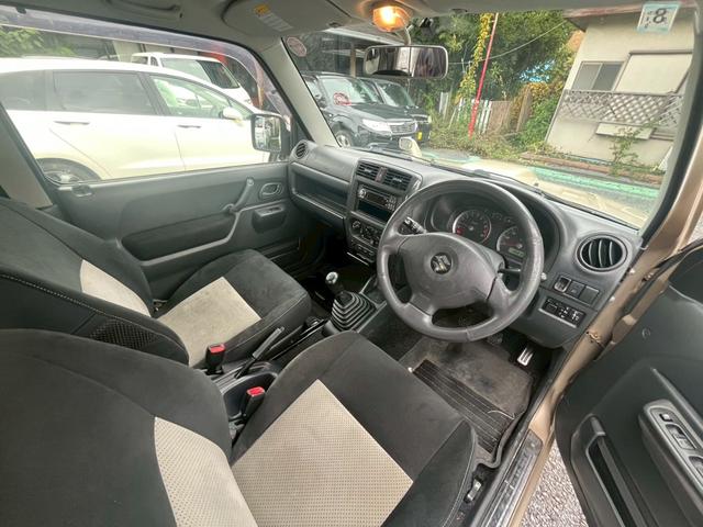 ジムニー ワイルドウインド 5速MT 16インチAW シートヒーター 寒冷地仕様 ルーフレール パワステ パワーウィンドウ 運転席・助手席エアバッグ エアコン クーラー フロントフォグランプ(17枚目)