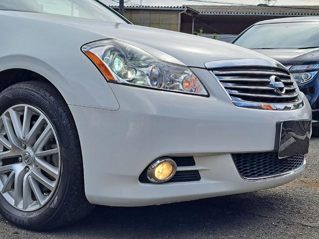 フーガ ３５０ＧＴ　ベージュレザーシート　ＨＤＤナビ　バック／サイドブラインドカメラ　シートヒーター／クーラー　助手席オットマン　純正１８インチアルミホイール　ＡＦＳ　ビルトインＥＴＣ　ＨＩＤヘッドライト（30枚目）