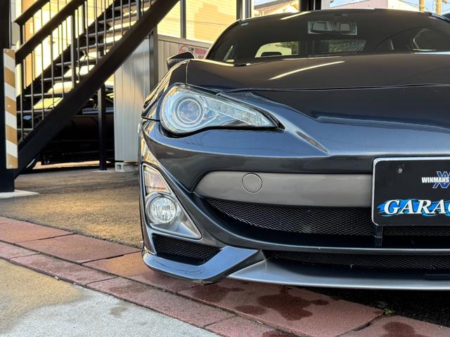 ８６ ＧＴリミテッド　ＴＯＭ’Ｓ　フロントバンパー社外サイドステップＴＲＵＳＴマフラー　ＷＯＲＫ　ＺＥＡＳＴ１９ｉｎＡＷＶａｌｅｎｔｉテール　ＢＬＩＴＺシフトノブ　純正ナビ（Ｂｌｕｅｔｏｏｔｈ／ＴＶ／バックカメラ）　ＥＴＣ（15枚目）