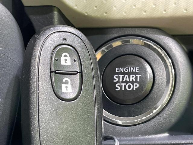 モコ X 純正ナビ バックカメラ スマートキー オートエアコン CD フルセグ Bluetooth再生 革巻きハンドル プライバシーガラス 盗難防止システム(5枚目)