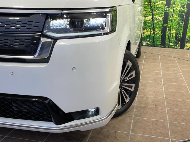 ステップワゴン e:HEVスパーダ プレミアムライン 純正11型ナビ 全周囲カメラ 衝突軽減 レーダークルーズ 両側電動スライドア 電動リアゲート シートヒーター BSM ステアリングスイッチ ハーフレザーシート ドラレコ ETC オットマン(12枚目)