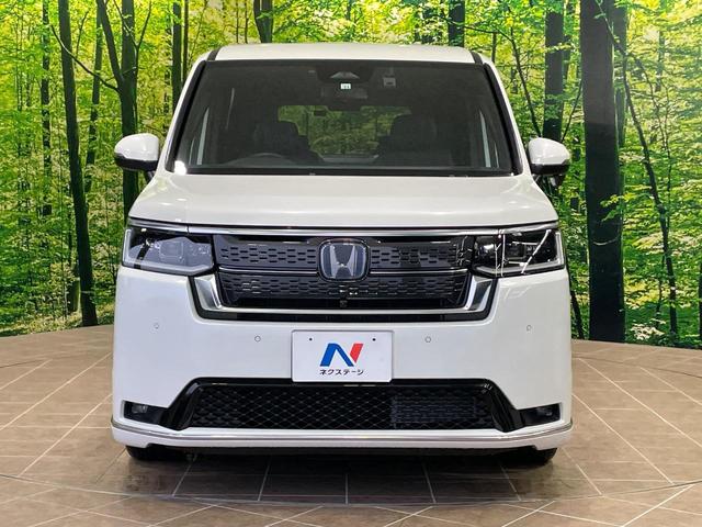 ステップワゴン e:HEVスパーダ プレミアムライン 純正11型ナビ 全周囲カメラ 衝突軽減 レーダークルーズ 両側電動スライドア 電動リアゲート シートヒーター BSM ステアリングスイッチ ハーフレザーシート ドラレコ ETC オットマン(14枚目)