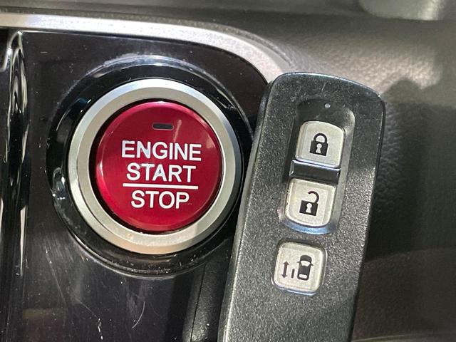 N-BOXカスタム G・Lパッケージ 電動スライドドア スマートキー HIDヘッド ETC デジタルインナーミラー オートライト オートエアコン 純正14インチアルミ 電動格納ミラー プライバシーガラス ドアバイザー 盗難防止システム(4枚目)