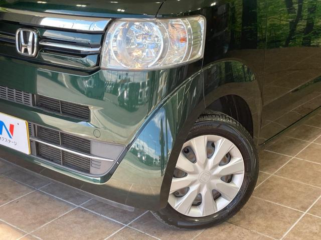 N-BOX G ターボSSパッケージ 純正ナビ バックカメラ 両側電動スライドドア 衝突軽減 HIDヘッド オートライト シートヒーター オートエアコン 革巻きハンドル プライバシーガラス シートバックテーブル ロールサンシェイド(12枚目)