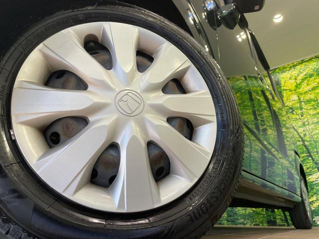 N-BOX G ターボSSパッケージ 純正ナビ バックカメラ 両側電動スライドドア 衝突軽減 HIDヘッド オートライト シートヒーター オートエアコン 革巻きハンドル プライバシーガラス シートバックテーブル ロールサンシェイド(13枚目)