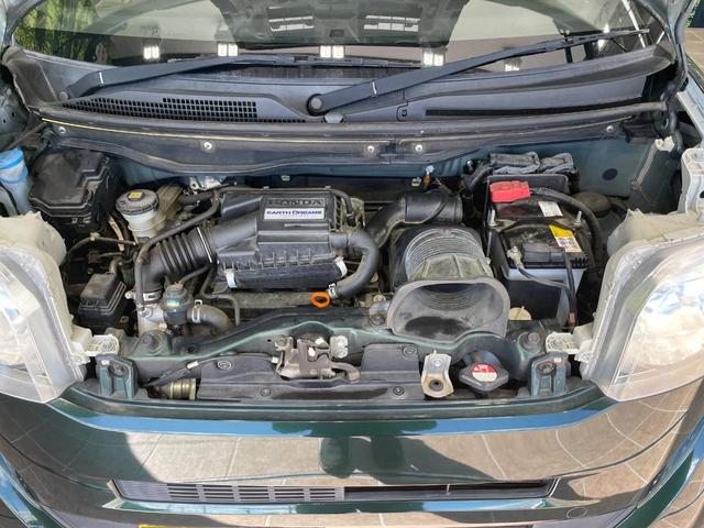 N-BOX G ターボSSパッケージ 純正ナビ バックカメラ 両側電動スライドドア 衝突軽減 HIDヘッド オートライト シートヒーター オートエアコン 革巻きハンドル プライバシーガラス シートバックテーブル ロールサンシェイド(18枚目)