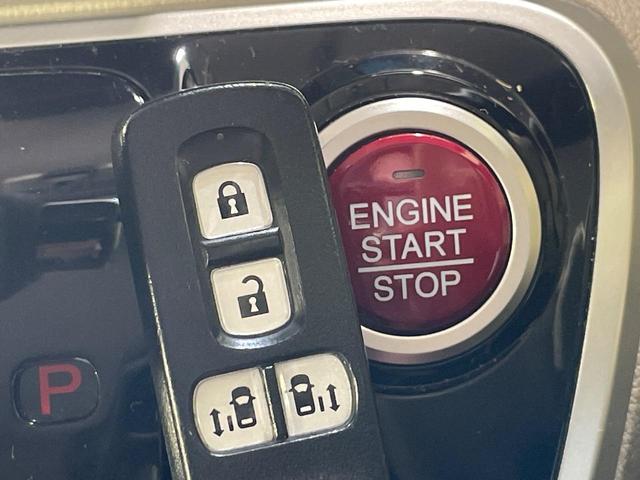 N-BOX G ターボSSパッケージ 純正ナビ バックカメラ 両側電動スライドドア 衝突軽減 HIDヘッド オートライト シートヒーター オートエアコン 革巻きハンドル プライバシーガラス シートバックテーブル ロールサンシェイド(25枚目)