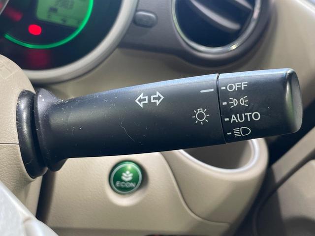 N-BOX G ターボSSパッケージ 純正ナビ バックカメラ 両側電動スライドドア 衝突軽減 HIDヘッド オートライト シートヒーター オートエアコン 革巻きハンドル プライバシーガラス シートバックテーブル ロールサンシェイド(28枚目)