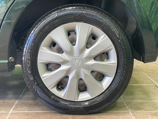 N-BOX G ターボSSパッケージ 純正ナビ バックカメラ 両側電動スライドドア 衝突軽減 HIDヘッド オートライト シートヒーター オートエアコン 革巻きハンドル プライバシーガラス シートバックテーブル ロールサンシェイド(65枚目)