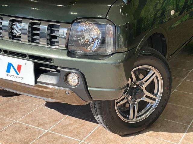 ジムニー ランドベンチャー MT車 純正ナビ 合皮レザーシート シートヒーター コーナーセンサー ETC 純正16インチAW 電動格納ミラー キーレス Bluetooth CD DVD再生 フルセグ ステアリングスイッチ(12枚目)