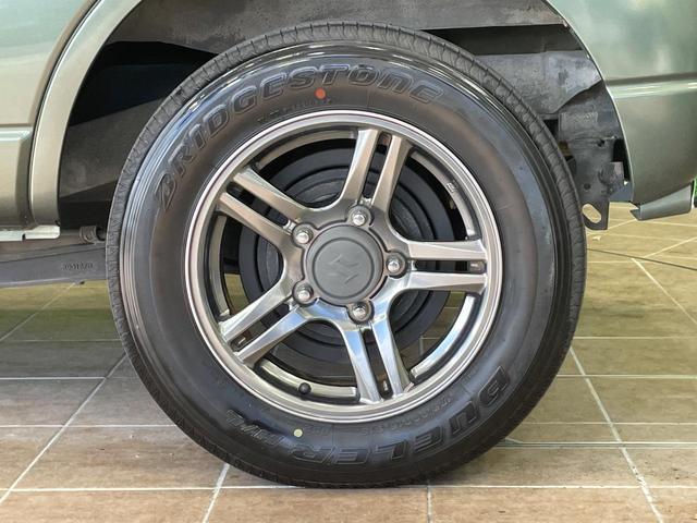 ジムニー ランドベンチャー MT車 純正ナビ 合皮レザーシート シートヒーター コーナーセンサー ETC 純正16インチAW 電動格納ミラー キーレス Bluetooth CD DVD再生 フルセグ ステアリングスイッチ(53枚目)