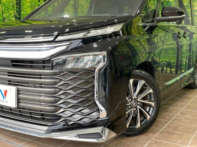 ヴォクシー S-Z モデリスタエアロ 純正10.5型ナビ 両側電動スライドドア バックカメラ 衝突軽減 レーダークルーズ 電動リアゲート オットマン ハーフレザーシート シートヒーター ドラレコ LEDヘッド ETC(13枚目)