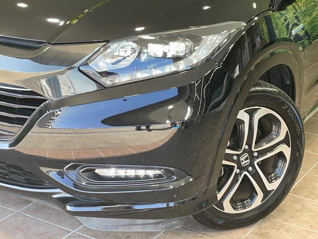 ヴェゼル ハイブリッドＺ・ホンダセンシング　純正ＳＤナビ　バックカメラ　衝突被害軽減システム　レーダークルーズ　禁煙車　ドラレコ　スマートキー　ＬＥＤヘッド　ビルトインＥＴＣ　車線逸脱警報　オートライト　デュアルエアコン　純正１７インチアルミ（12枚目）