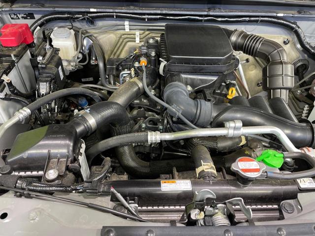 ジムニー ＸＣ　届出済未使用車　衝突軽減　コーナーセンサー　クルーズコントロール　シートヒーター　スマートキー　ＬＥＤヘッド　車線逸脱警報　革巻きハンドル　ステアリングスイッチ　オートエアコン　純正１６インチＡＷ（18枚目）