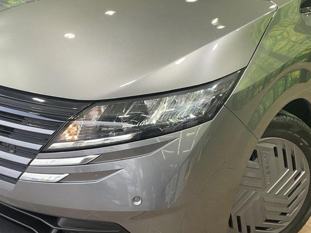 ノート X 純正9型ディスプレイオーディオ バックカメラ 衝突軽減 クリアランスソナー LEDヘッド スマートキー ETC オートハイビーム 車線逸脱防止警報 オートエアコン 盗難防止装置 プライバシーガラス(12枚目)