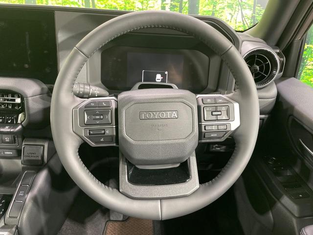 ランドクルーザー２５０ ＶＸ　サンルーフ　純正１２．３型ディスプレイ　全周囲カメラ　衝突軽減　レーダークルーズ　電動リアゲート　黒革シート　ＥＴＣ　快適温熱シート　パワーシート　ステアリングヒーター　コーナーセンサー　ＬＥＤヘッド（12枚目）