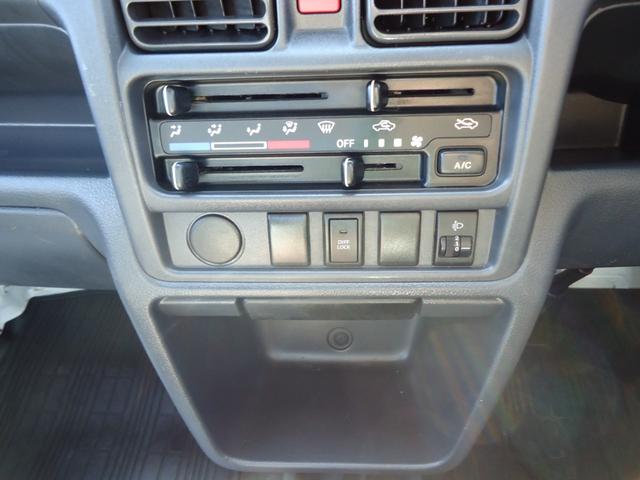 NT100クリッパートラック DX農繁仕様 4WD 5MT ローハイ切り替えスイッチ エアコン パワステ 3方開き ETC 運転席エアバッグ AM/FMラジオ 作業灯(12枚目)