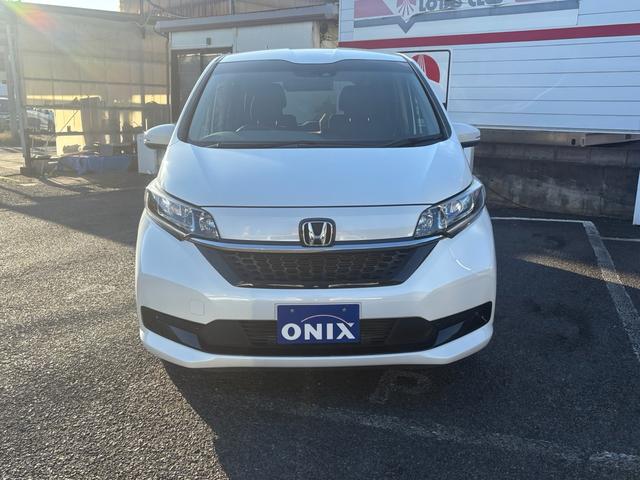 フリードハイブリッド ハイブリッド・Ｇホンダセンシング　１２ヵ月１２，０００ｋｍ保証付　純正ナビ　ワンセグＴＶ　Ｂｌｕｅｔｏｏｔｈ接続　バックカメラ　コーナーセンサー　社外ＡＷ　両側パワースライドドア　クルーズコントロール　スマートキー　電格ミラー（2枚目）