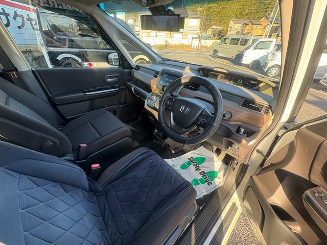 フリードハイブリッド ハイブリッド・Ｇホンダセンシング　１２ヵ月１２，０００ｋｍ保証付　純正ナビ　ワンセグＴＶ　Ｂｌｕｅｔｏｏｔｈ接続　バックカメラ　コーナーセンサー　社外ＡＷ　両側パワースライドドア　クルーズコントロール　スマートキー　電格ミラー（9枚目）