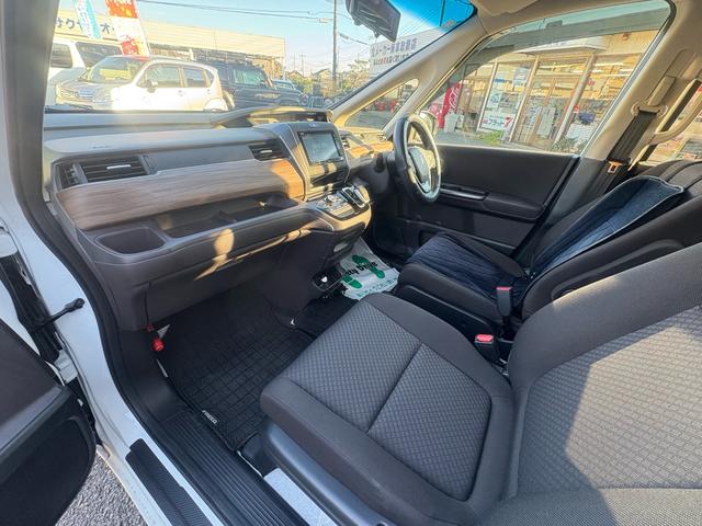 フリードハイブリッド ハイブリッド・Ｇホンダセンシング　１２ヵ月１２，０００ｋｍ保証付　純正ナビ　ワンセグＴＶ　Ｂｌｕｅｔｏｏｔｈ接続　バックカメラ　コーナーセンサー　社外ＡＷ　両側パワースライドドア　クルーズコントロール　スマートキー　電格ミラー（11枚目）