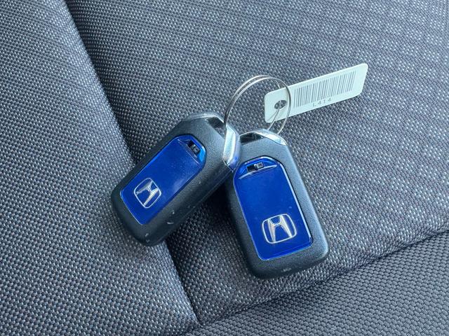 フリードハイブリッド ハイブリッド・Ｇホンダセンシング　１２ヵ月１２，０００ｋｍ保証付　純正ナビ　ワンセグＴＶ　Ｂｌｕｅｔｏｏｔｈ接続　バックカメラ　コーナーセンサー　社外ＡＷ　両側パワースライドドア　クルーズコントロール　スマートキー　電格ミラー（25枚目）