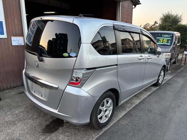 フリード G ジャストセレクション タイミングチェーン メモリーナビTV スマートキー 両側パワースライドドア リアカメラ HID ETC DVD CD AW(2枚目)