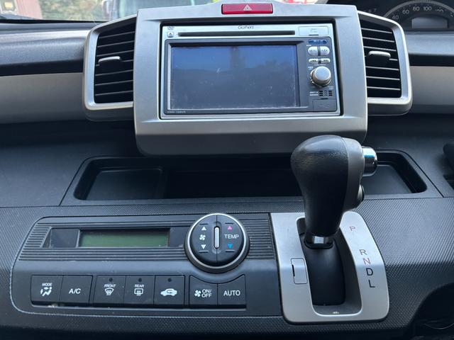 フリード G ジャストセレクション タイミングチェーン メモリーナビTV スマートキー 両側パワースライドドア リアカメラ HID ETC DVD CD AW(4枚目)